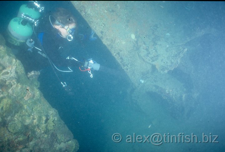 Prop Shaft.jpg - Marion looking at where the prop shaft would have stuck out